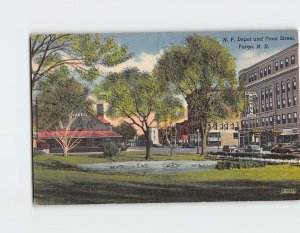 Postcard N. P. Depot and Front Street Fargo North Dakota USA