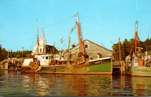 Maine Boothbay Harbor Catholic Church With Fishing Draggers In The Foreground...