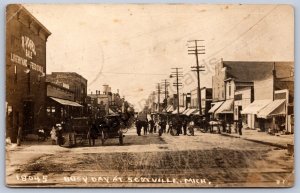 K26/ Scotville Michigan RPPC Postcard c1910 Vogel Livery Stores People 52