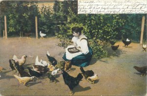 Woman feeding poultry birds hen vintage 1904 postcard