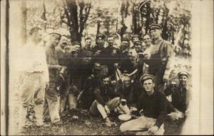 Soldiers?  Men Wearing Caps Mugs of Beer c1910 Real Photo Postcard