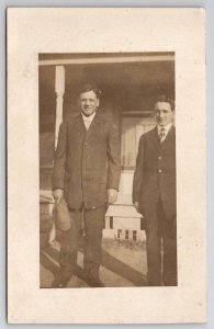 RPPC Two Men Pose Near Porch Postcard M27