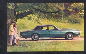 1968 FORD THUNDERBIRD FOUR DOOR LANDAU CAR DEALER ADVERTISING POSTCARD