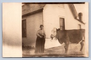 J93/ Interesting RPPC Postcard c1910 Woman Farmer Pet Cow Home 321