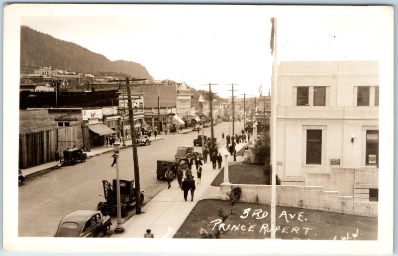 c1930s Prince Rupert, British Columbia RPPC 3rd Ave Downtown Shop Sign Cars A326