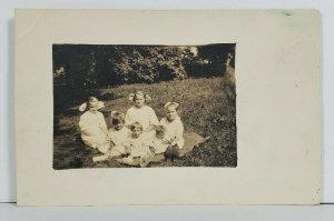 Darling Children on Blanket Cute White Hair Bows Real Photo Postcard O7