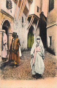 Algerian veiled woman type street view postcard