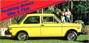Vintage 1970s Fiat 128 2-Door Sedan Advertising Postcard Yellow Car