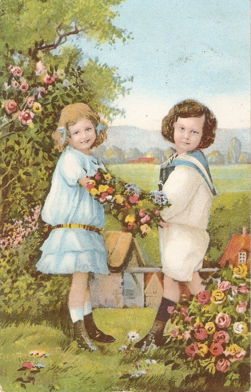 Two little girls carrying a basket with flowers Nice old vintage German postca