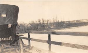 D95/ Burwell Nebraska Ne Automobile RPPC Postcard c1910 Car Lake Hand out Window