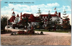 Hotel Del Coronado California CA Pine Trees Around The Building Roadway Postcard