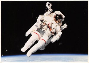 Astronaut in space propelled by a man and maneuvering unit Space Unused 