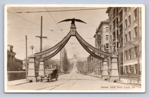 J95/ Salt Lake City Utah RPPC Postcard c1929 Eagle Gate Street Buildings 60