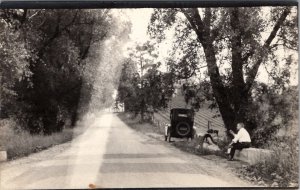 RPPC Roadside Picnic Women Under Tree Man on Wall Old Car Parked Postcard Y18