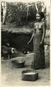 indonesia, BALI, Native Nude Balinese Woman feeding Pig (1920s) RPPC Postcard