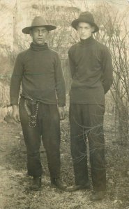 C-1910 Young men Pistol Firearm Holster RPPC Photo Postcard 21-9191