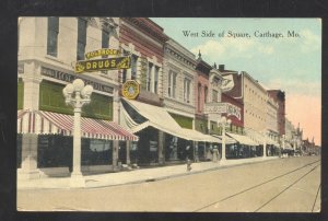 CARTHAGE MISSOURI DOWNTOWN SQUARE STREET SCENE DRUG STORE VINTAGE POSTCARD
