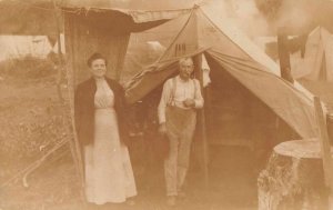 Woman and man by Tent Camping Scene Real Photo Vintage Postcard JF686449