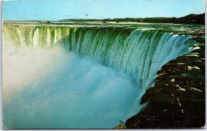 VINTAGE POSTCARD VIEW OF THE CANADIAN HORSESHOE FALLS FROM THE PARK POSTED 1957