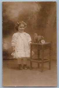 1912 Little Girl Toy Stuffed Dog Studio Madison New Jersey RPPC Photo Postcard