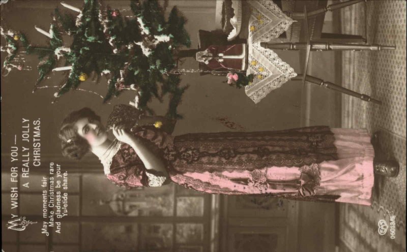 EAS Christmas Beautiful Woman Santa Doll Vintage Tinted RPPC Postcard