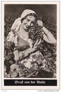 RP: Gruss aus Mosel , Germany , 30-50s ; Woman w/ grapes