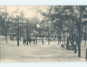 old card CHILDREN ON SWING SET AT NORTH PARK Dalny - Dairen - Dalian China F4754