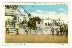 WY - Cheyenne. Frontier Days, Riding an Outlaw
