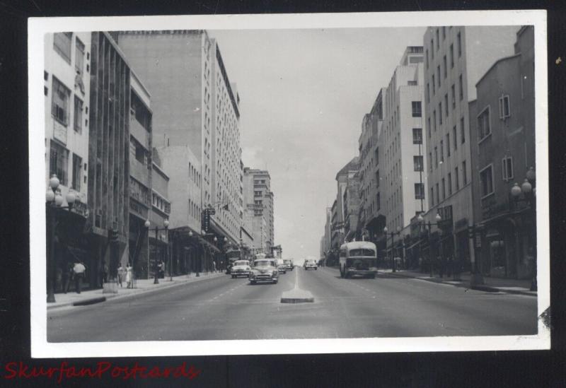 RPPC CARACAS VENEZUELA DOWNTOWN STREET SCENE BUS CARS REAL PHOTO POSTCARD