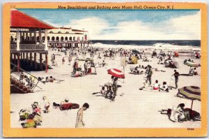 VINTAGE POSTCARD BEACH BATHING SCENE AT MUSIC HALL OCEAN CITY N.J. MAILED 1954