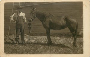 RPPC Postcard A Man and His Horse Victor Savioja