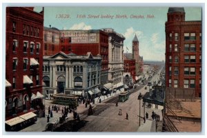 1910 16th Street Looking North Omaha Nebraska Streetcars Road Buildings Postcard