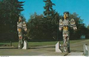 COURTENAY , British Columbia, Canada, 50-60s; Totem poles