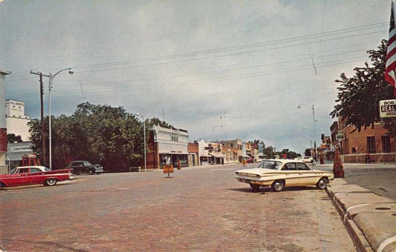 Hillsboro Kansas Main Street and Real Estate Office Vintage Postcard JI657436