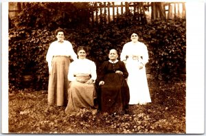 Family of Four Women in Formal Long Dresses Smiling Portrait- Vintage Postcard