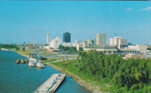 Louisiana Baton Rouge Skyline WithTugboats On The Mississippi River