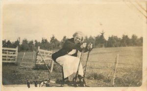 Postcard RPPC C-1910 Fun woman Farm Equipment 23-3932