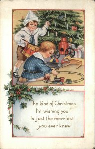 Whitney Christmas Children Play with Christmas Toys Train Set Vintage Postcard