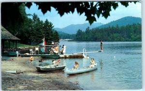 LAKE PLACID, New York NY  Beach at MIRROR LAKE INN Roadside Canoes 1963 Postcard