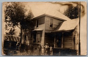 Postcard RPPC c1900s United States Men in Front of House Ladder Horses Carpenter