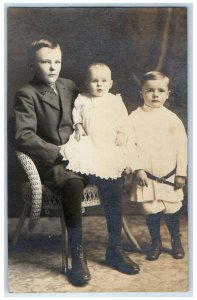 1908 Boys And Baby Girl Studio Portrait Garner Iowa IA RPPC Photo Postcard