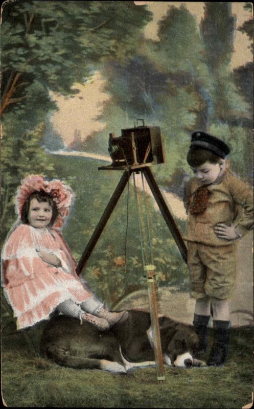 Little Boy and Girl w Dog and Old Camera PHOTO SHOOT c1910 Postcard