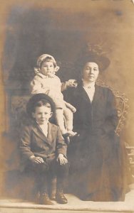 Woman with Two Children Real Photo Unused 