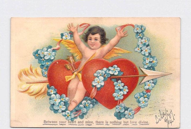 ANTIQUE POSTCARD VALENTINE CUPID SITTING BETWEEN TWO HEARTS ARROW FLOWER GARLAND