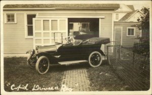 Cupid Drives a REO Auto Car Advertising? Real Photo Postcard c1910