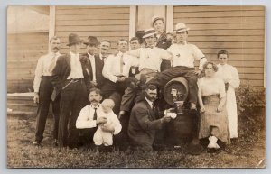 McCormick WA RPPC Handsome Men Lumber Co Workers With Malt Barrel Postcard C46