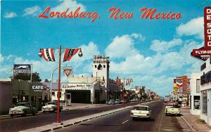 c1960 Postcard Lordsburg NM Street Scene Conoco Gas Greyhound Bus Station, Signs