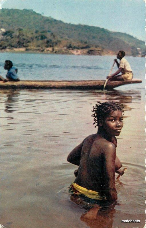 1960s Topless Nude Africa Canoe Young Bathing girl postcard 6477