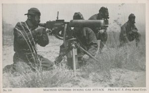 MACHINE GUNNERS DURING GAS ATTACK GAS MASKS USA WW1 MILITARY POSTCARD (c. 1917)
