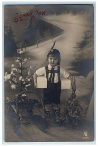 c1910's Christmas Tree Cute Boy Sleigh With Flowers Winter RPPC Photo Postcard